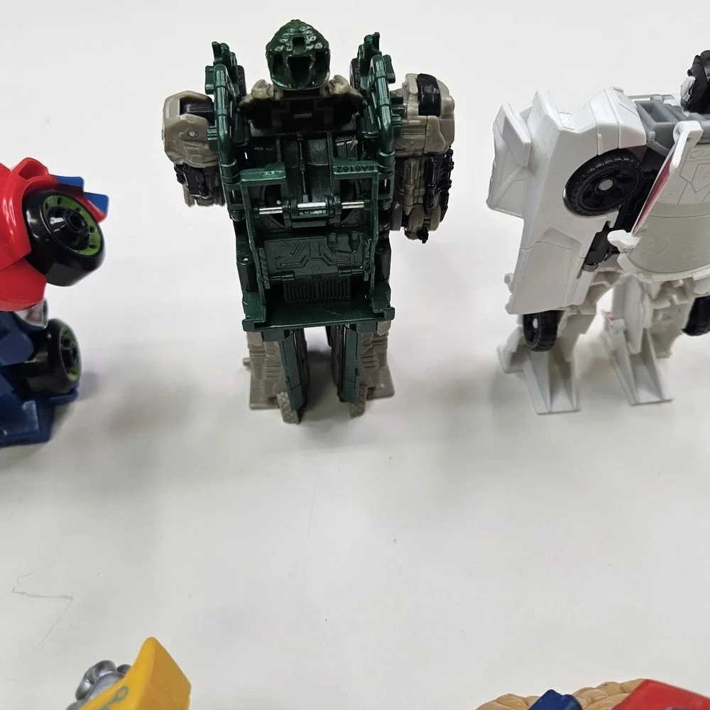 Lot of 5 Transformers Action Figures - Optimus Prime, Bumblebee & More
